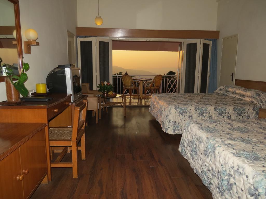 The Riverview Resort Chiplun Room photo