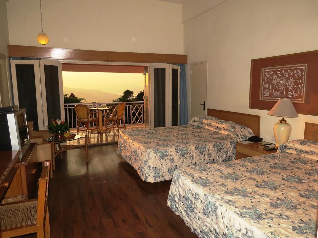 The Riverview Resort Chiplun Room photo